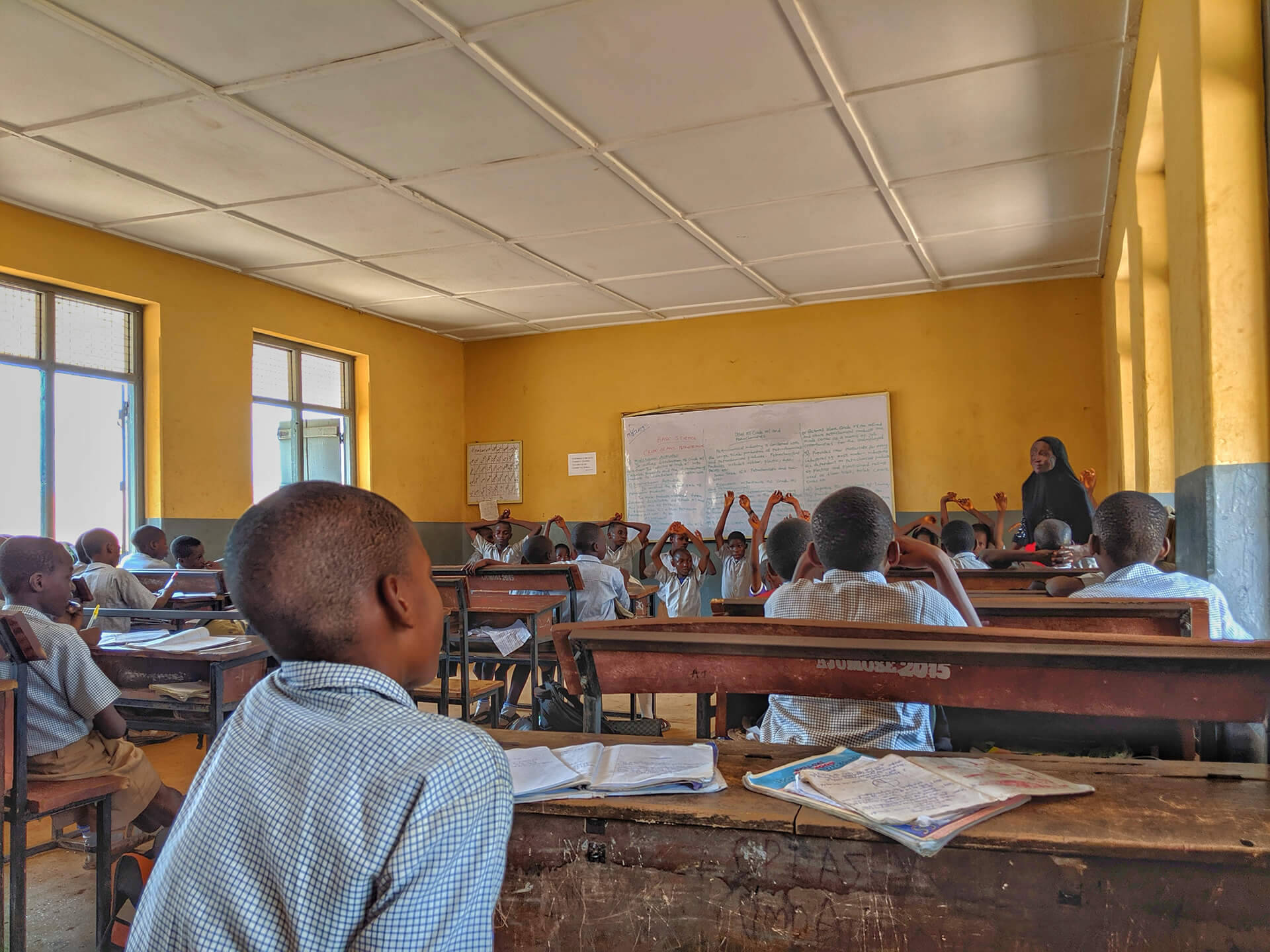 A classroom with students learning